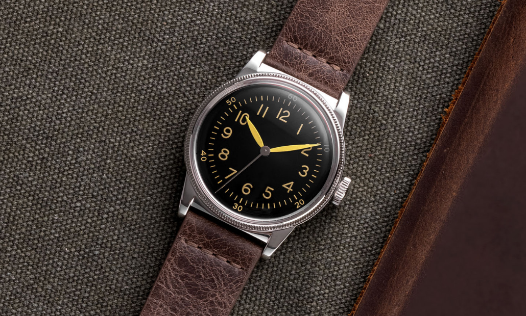A-11 field watch with a black dial on a brown leather strap