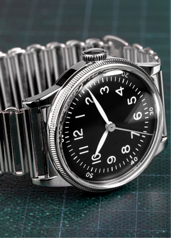 A-11 Tom Rice black dial watch on a steel bracelet