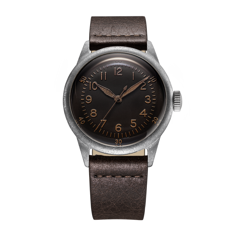 Patina military field watch with aged brown dial and real ocean-weathered steel case D-Day tribute